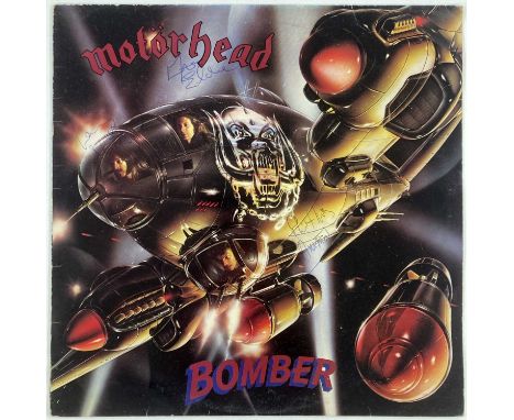 A copy of Motorhead - Bomber (BRON 523, blue vinyl, appears VG+ with some light scuffs) signed to front of sleeve by Lemmy, F