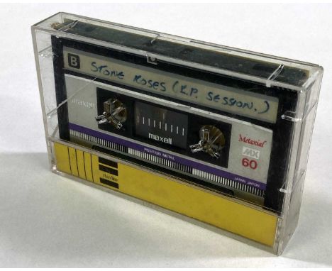 A Maxell Metaxial MX 60 cassette with 'Thin Line' inlay, handwritten info. Cassette contains ten tracks recorded by The Stone