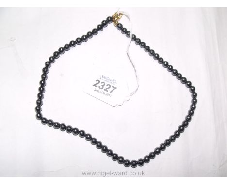 A grey pearl style 17" Necklace 