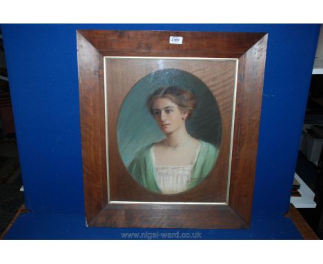 A Pastel Portrait of young lady, signed and dated 1908, in good frame