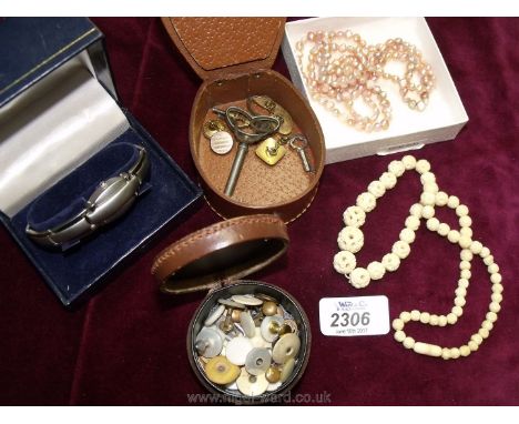 A pink pearl Necklace, steel wristwatch, miscellaneous studs and cuff links