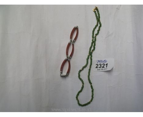 A 925 Silver red Jade Bracelet and a 9ct Jade Necklace.