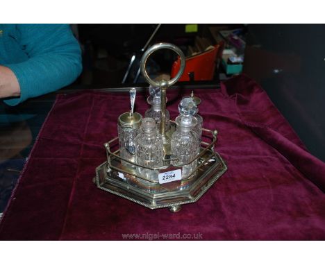 A vintage five piece cut glass and silver plate Cruet Set.