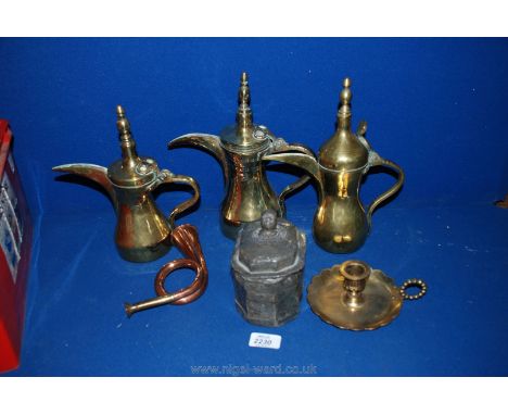 Three Arabic Coffee Pots, a copper hunting horn, a brass chamber stick and a lead tobacco jar