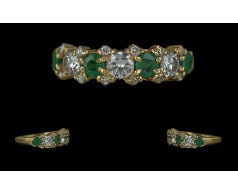 Ladies Excellent Quality 18ct Gold Emerald and Diamond Set Dress Ring, full hallmark to interior of shank, the faceted emeral