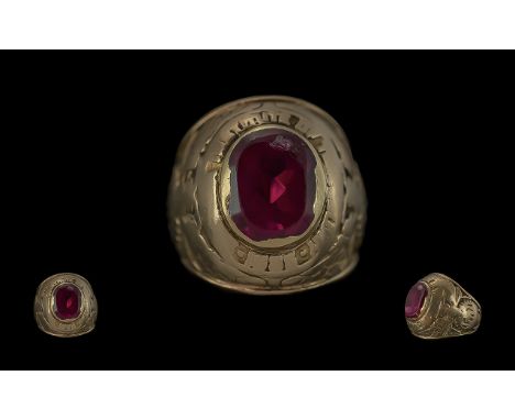 10ct Gold Heavy Single Stone Ruby Set College Ring, full marks to shank, ruby with edge knocks but excellent colour, ring siz