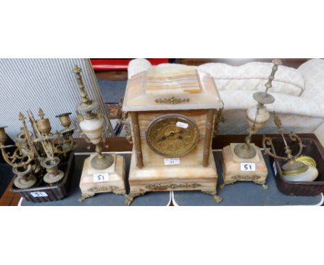 A marble mantel clock and garniture