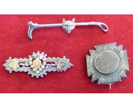 A Victorian silver sweetheart brooch Birmingham 1898 with paste set heart, a silver hunting bar brooch, and Victorian silver 