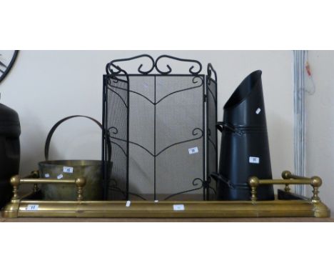 A brass fire fender, jam pan, fireguard and a coal bucket (4)
