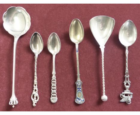 A Danish silver commemorative spoon by Dansk Guldindustri, c1950 with crown terminal, a Scandinavian silver gilt and enamel t