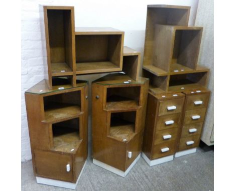 A pair of bedside cabinets together with a pair of bedside drawers and two shelf units