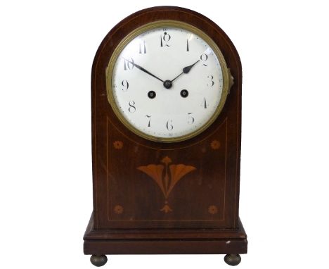 A French early 20th century mahogany and boxwood strung mantel clock, the white enamel dial with black arabic numerals, the m