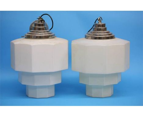 A pair of 1930's Art Deco octagonal white glass and graduating light shades with chrome mounts.  40 cm high