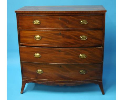 A Georgian mahogany bow front chest of drawers with four long graduated drawers supported on splayed bracket feet.  109 cm wi