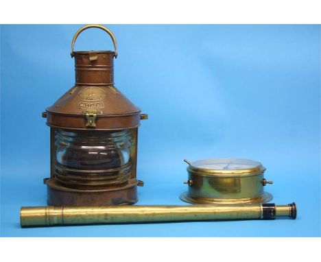 A copper 'Tung Woo' masthead ship's light, a brass single drawer telescope and a brass ship's clock.