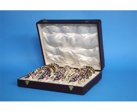 A Royal Crown Derby Imari six piece set comprising six coffee cans and six saucers, in a Presentation box, red printed mark, 