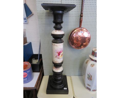 An early 20th Century ebonised and ceramic pedestal plant stand 