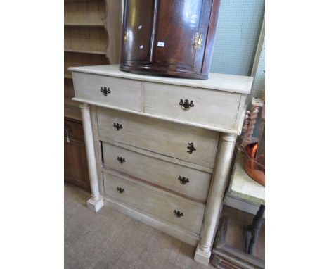 A painted pine Scotch style chest, with two short and three long drawers of pillared side supports 