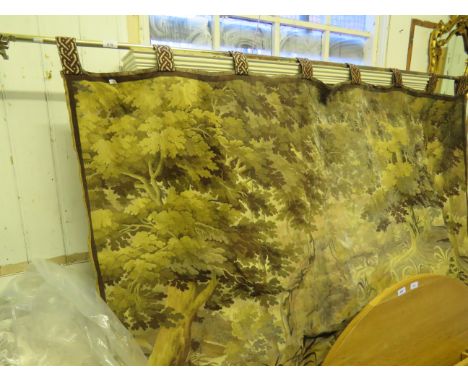 A tapestry wall hanging depicting a woodland landscape 