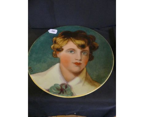 Worcester Royal Porcelain Works charger, decorated with a head and shoulders portrait of a young woman, initialled C.K.R. and