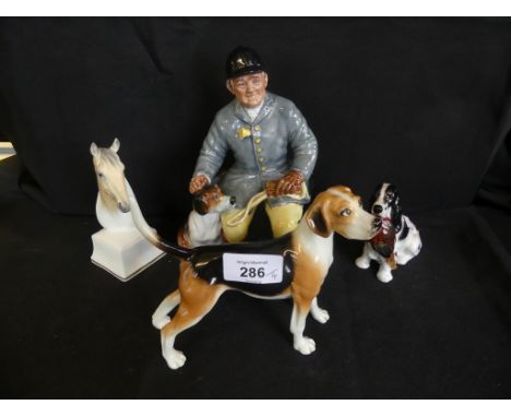 A mixed lot comprising Royal Doulton figure The Huntsman, together with a Beswick model beagle, a Royal Doulton Springer Span