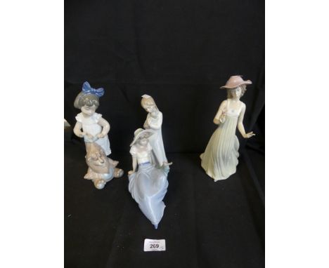 Four various Nao figures comprising girl with flower, girl with puppy, girl with bird and girl with cuddly toy (4) 