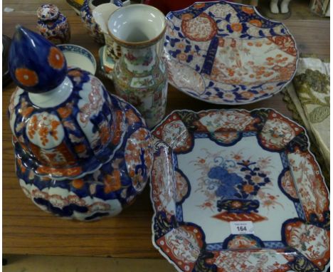 A mixed lot of various Imari and other ceramic items to include two large dishes, large covered vase, various smaller vases, 