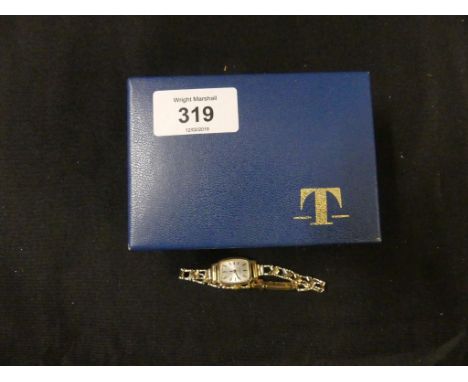 A 9ct gold Tissot wristwatchThe 9ct gold watch with fancy link bracelet, with maker's box, weight approx. 15.1g. 