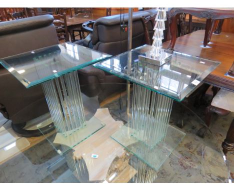 A pair of contemporary glass top lamp tables, each square table top supported on an arrangement of twenty glass rods, also a 