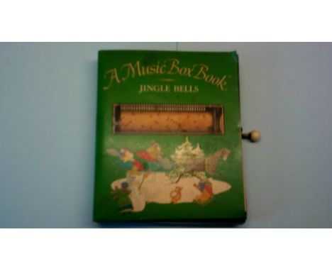 Vintage Music Box Book- 'Jingle Bells' hand wind in excellent condition with colour illustration