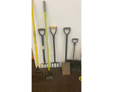 Selection of garden tools to include hose, rakes, spade etc 