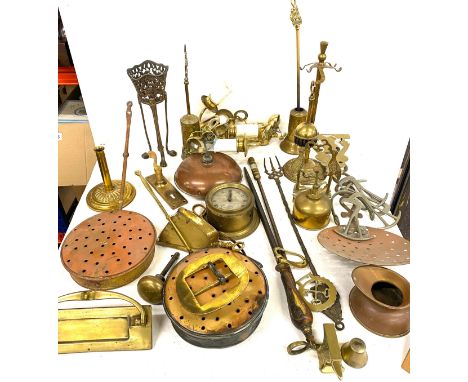 Large selection of brass and copper ware includes light fittings etc 