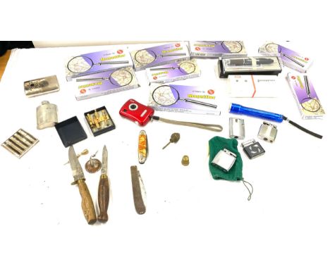 Large selection of miscellaneous includes lighters, pens, flasks, camera etc 