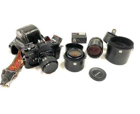 Fujica st80i camera in case with Fujica 135mm photo film lense with case and a Fujica 28mm lense 