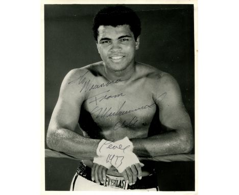 ALI MUHAMMAD: (1942-2016) American World Heavyweight boxing champion. Signed and inscribed 8 x 10 photograph of Ali standing 