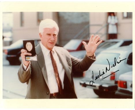 NIELSEN LESLIE: (1926-2010) Canadian actor. Signed colour 10 x 8 photograph of Nielsen standing outdoors in a half-length pos