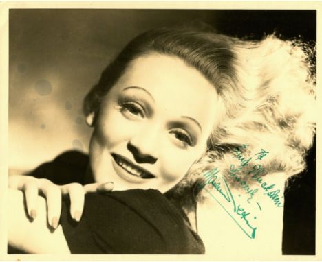 DIETRICH MARLENE: (1901-1992) German-born American actress. Vintage signed and inscribed sepia 10 x 8 photograph of the actre