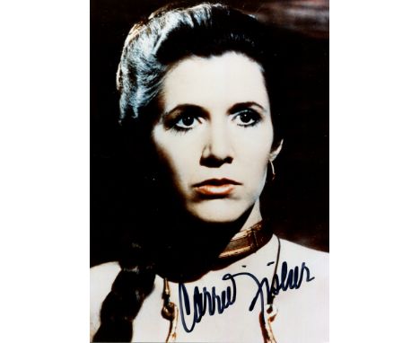 FISHER CARRIE: (1956-2016) American actress. Signed colour 5 x 7 photograph of Fisher in a head and shoulders pose in costume