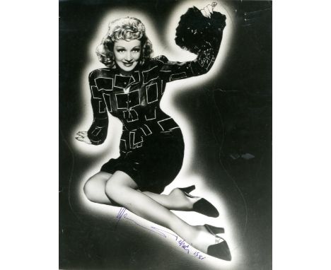 DIETRICH MARLENE: (1901-1992) German-born American actress. Vintage signed 10.5 x 13.5 photograph, an unusually composed imag