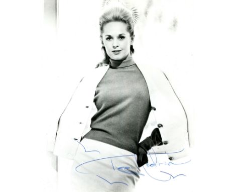 HEDREN TIPPI: (1930-&nbsp; &nbsp;&nbsp;&nbsp;) American actress. Signed 8 x 10 photograph of Hedren standing in an alluring t
