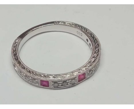 A GOOD WHITE GOLD DIAMOND AND RUBY HALF ETERNITY RING 18CT GOLD SIZE M - 3.3 GMS 