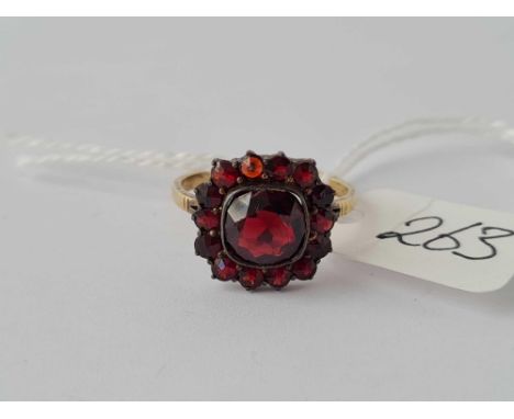 A Bohemian 10ct gold and garnet cluster ring size M