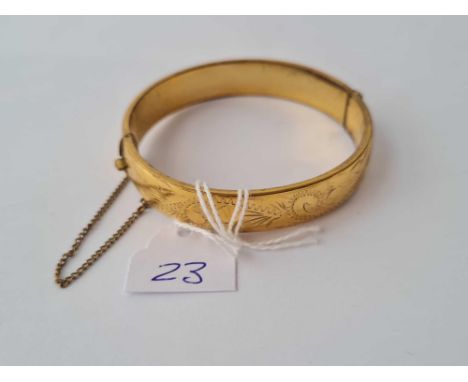 A rolled gold bangle 