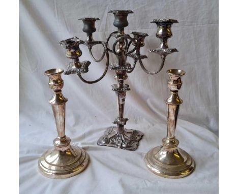 A five light candleabrum with scroll decorated rims.