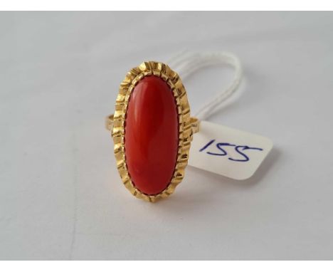 A good large oval coral ring 18ct gold size R 7.1 gms 