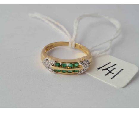 An unusual emerald and diamond 14ct gold ring size J 2.5g inc