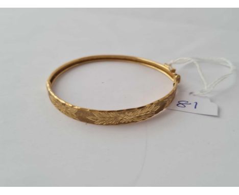 A 9ct bangle - 5.8 gms 