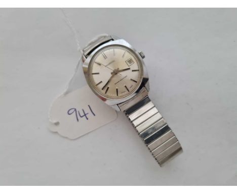 A gents Ingersoll wrist watch with seconds sweep and date aperture 