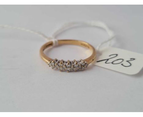  A diamond set half hoop 9ct ring with 0.20ct diamonds size Q 