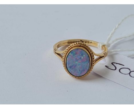 A large oval opal doublet ring 9 ct size M1/2 - 2.6 gms 